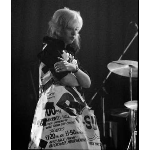 Debbie Harry 1978  wearing a poster as a dress that she had torn from the wall outside the venue