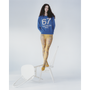 A model standing on a chair wearing the 1967 Fleetwood Mac knit.