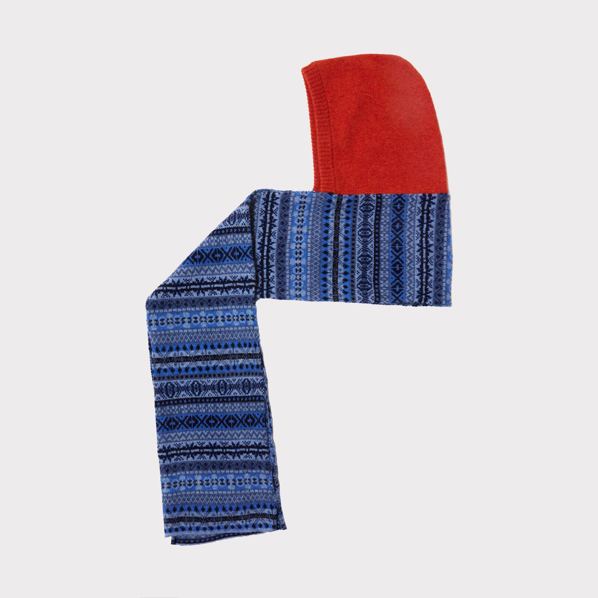 An image of The Burnt Orange & Blue Fair Isle hooded scarf laid flat on a light grey background.