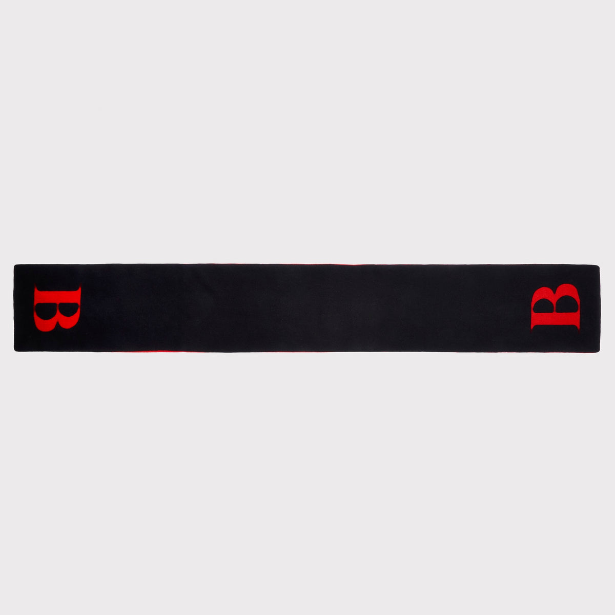 A black knit scarf with a red letter 'B' on each end, displayed flat against a light grey background.
