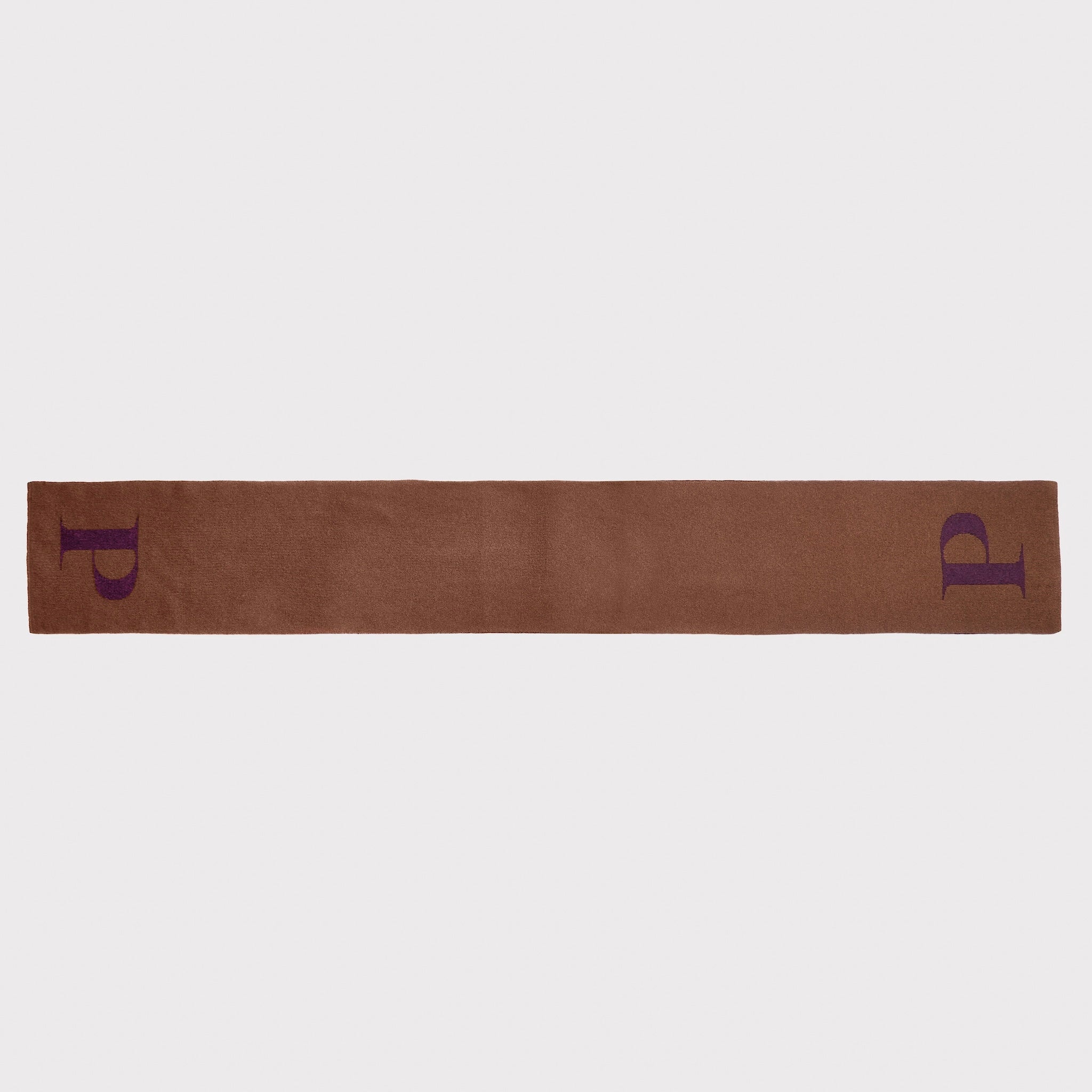 A brown knit scarf with a large purple letter 'P' knitted onto each end, shown laid flat against a light grey background.