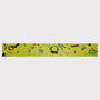 An image of the HADES Handbag scarf in bright lime green, printed with a variety of Handbag contents including headphones, a camera, a camera strap, a pencil shown flat against a light gray background.