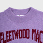 Close-up of the purple knit Albatross knit with 'FLEETWOOD MAC' arched in dark red lettering across the chest.