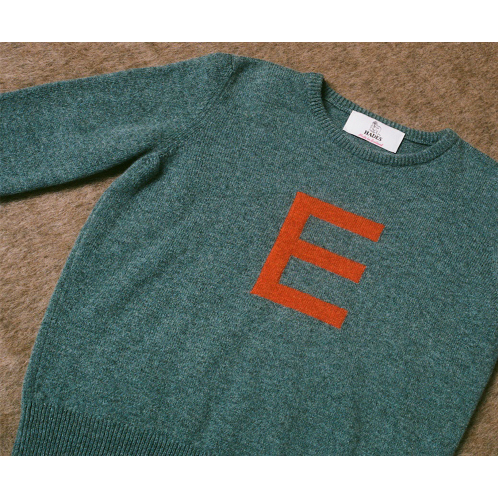 HADES caspian jumper with a red letter 'E' 