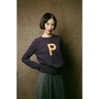 Model wearing HADES dark purple jumper with a yellow letter 'P' 