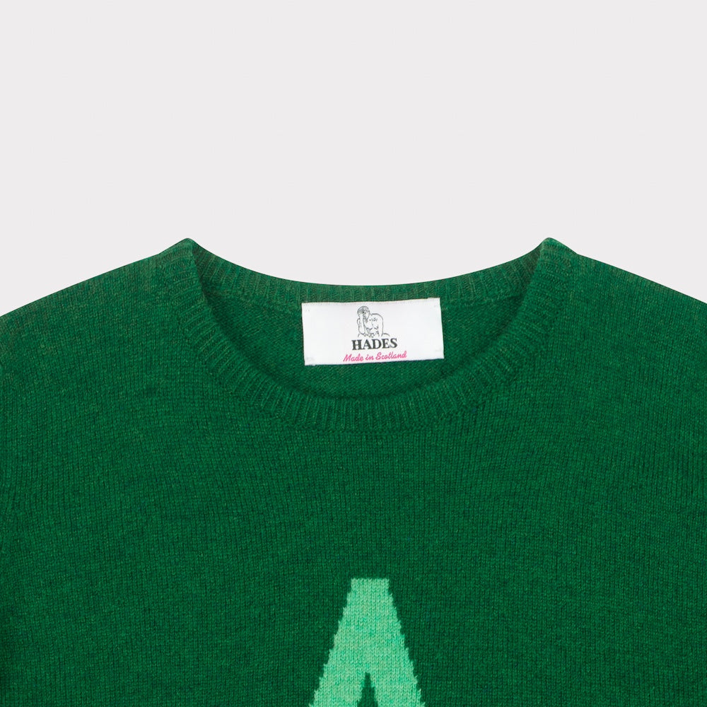  HADES green jumper with a letter 'A' necklabel