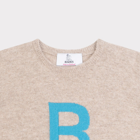HADES grey knit with a blue letter 'B' necklabel