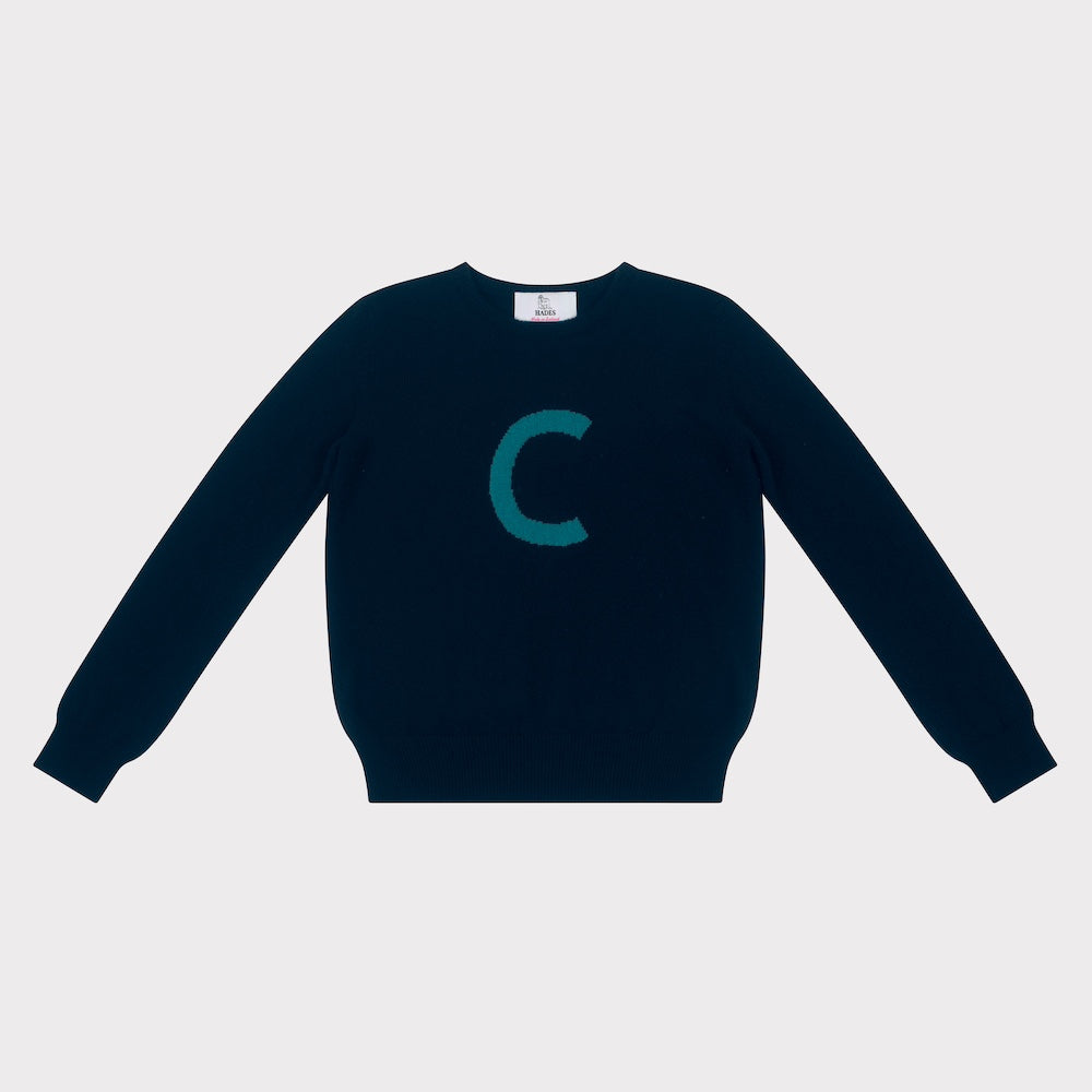 HADES Navy blue knit  with a turquoise letter 'C' 