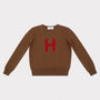 HADES brown jumper with a red letter 'H' 