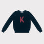 HADES navy sweater with a red letter 'K' 