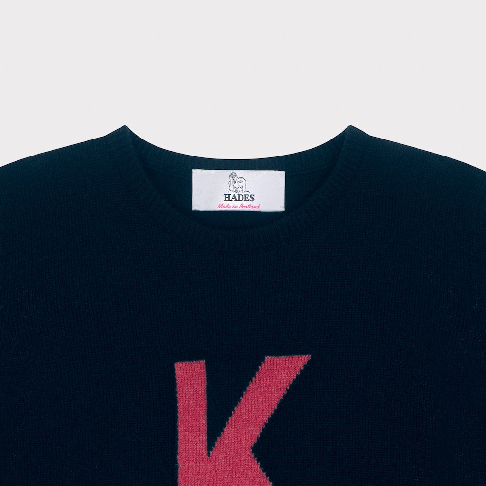 HADES navy sweater with a red letter 'K'  necklabel
