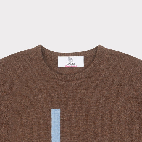 HADES Brown jumper with a blue letter 'L' necklabel