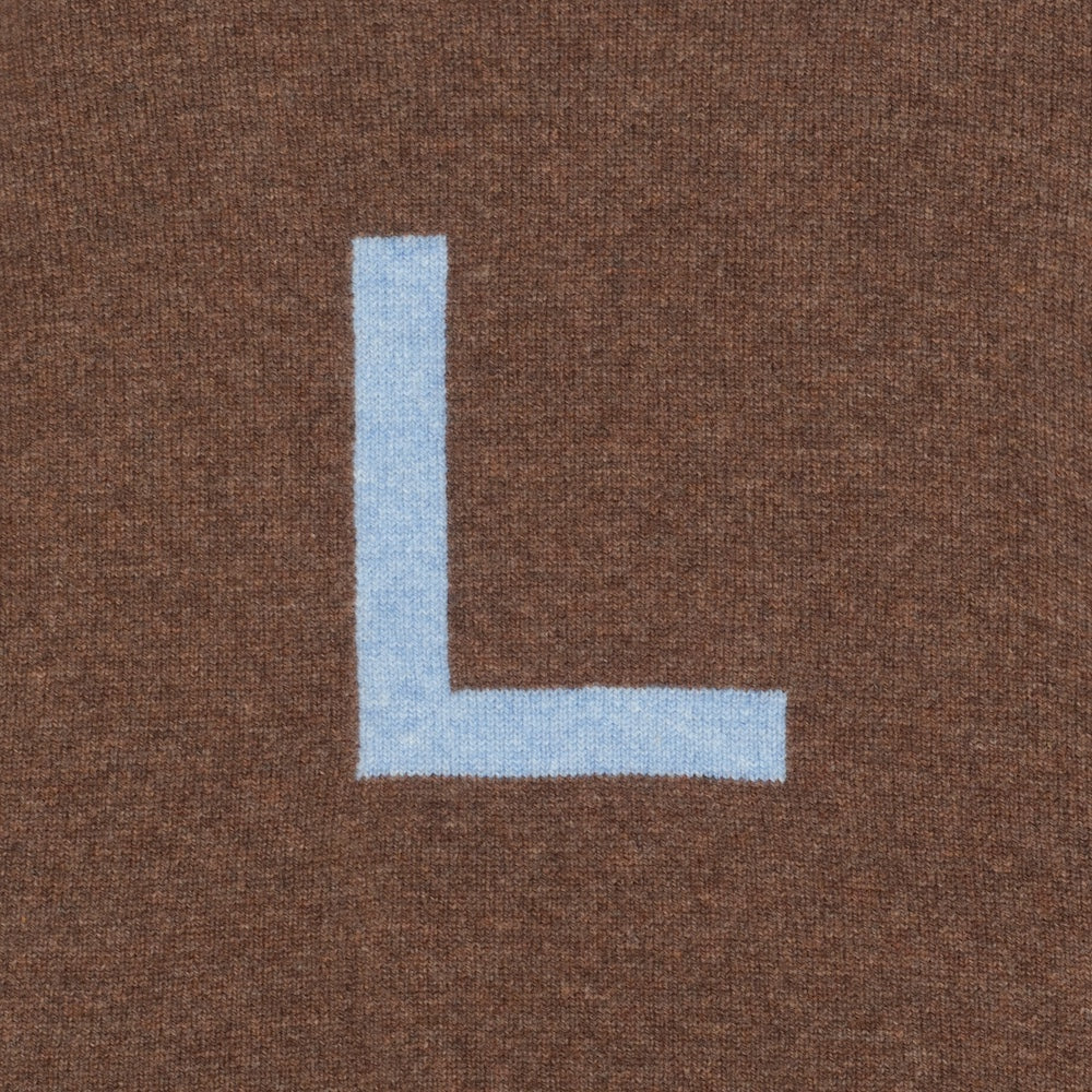 HADES Brown jumper with a blue letter 'L'  detail