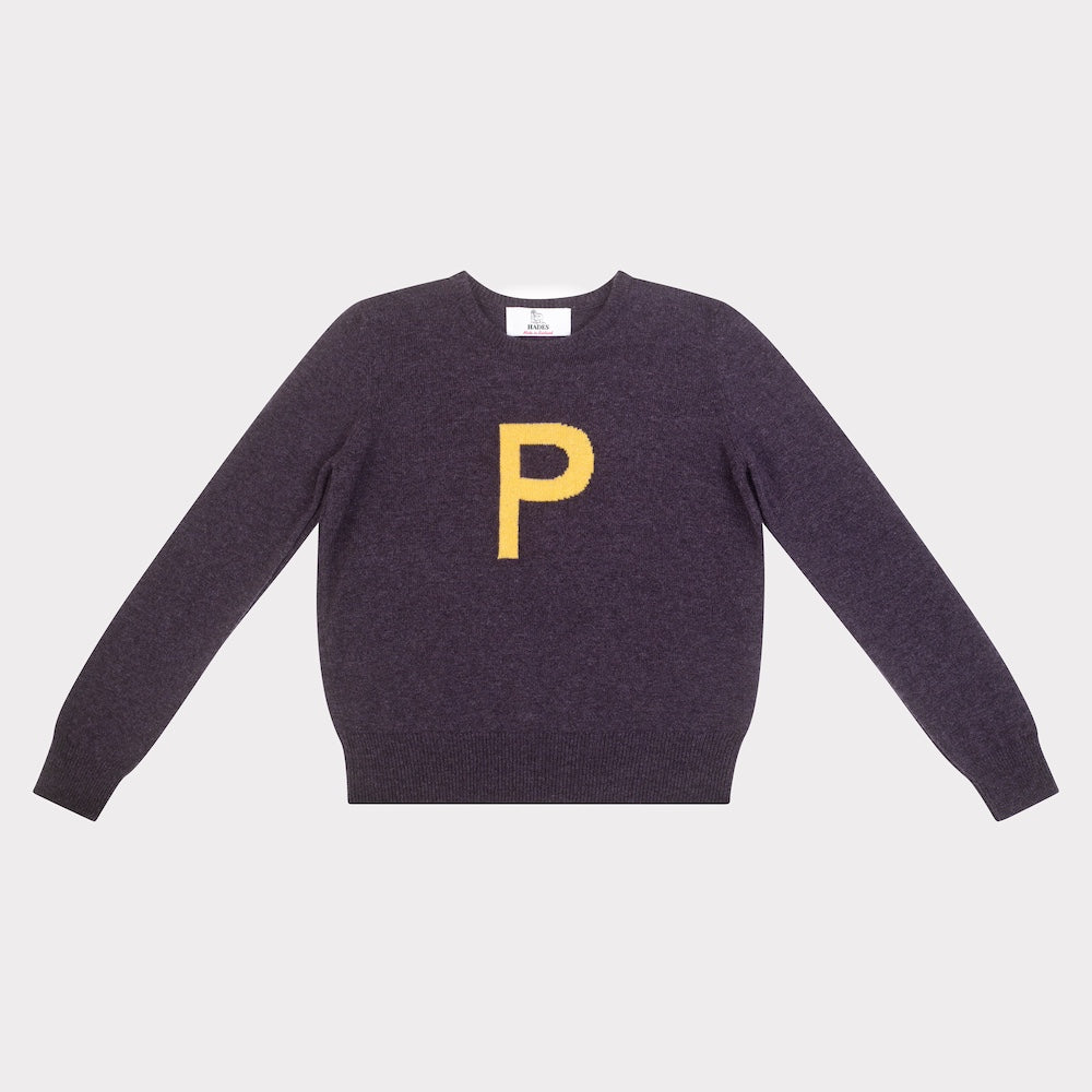 Dark purple jumper with a yellow letter 'P' 