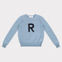 HADES light blue jumper with a navy letter 'R' 