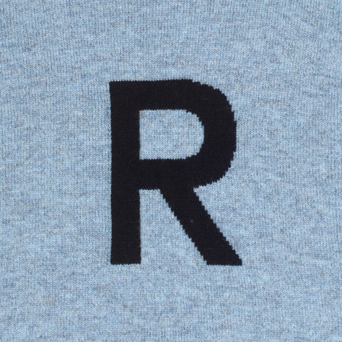 HADES light blue jumper with a navy letter 'R'  slogan