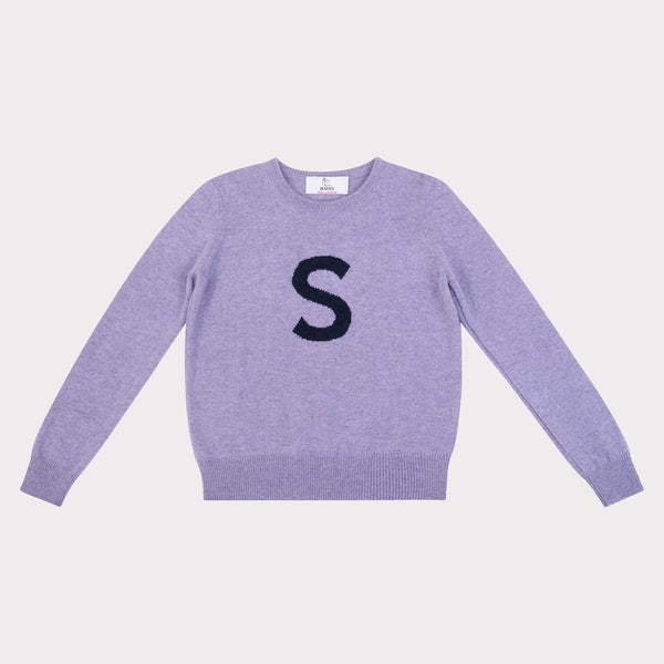 HADES purple jumper with a black 'S' 
