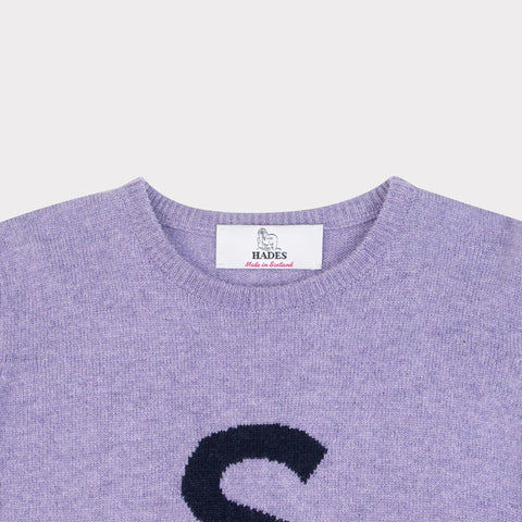 HADES purple jumper with a black 'S' necklabel