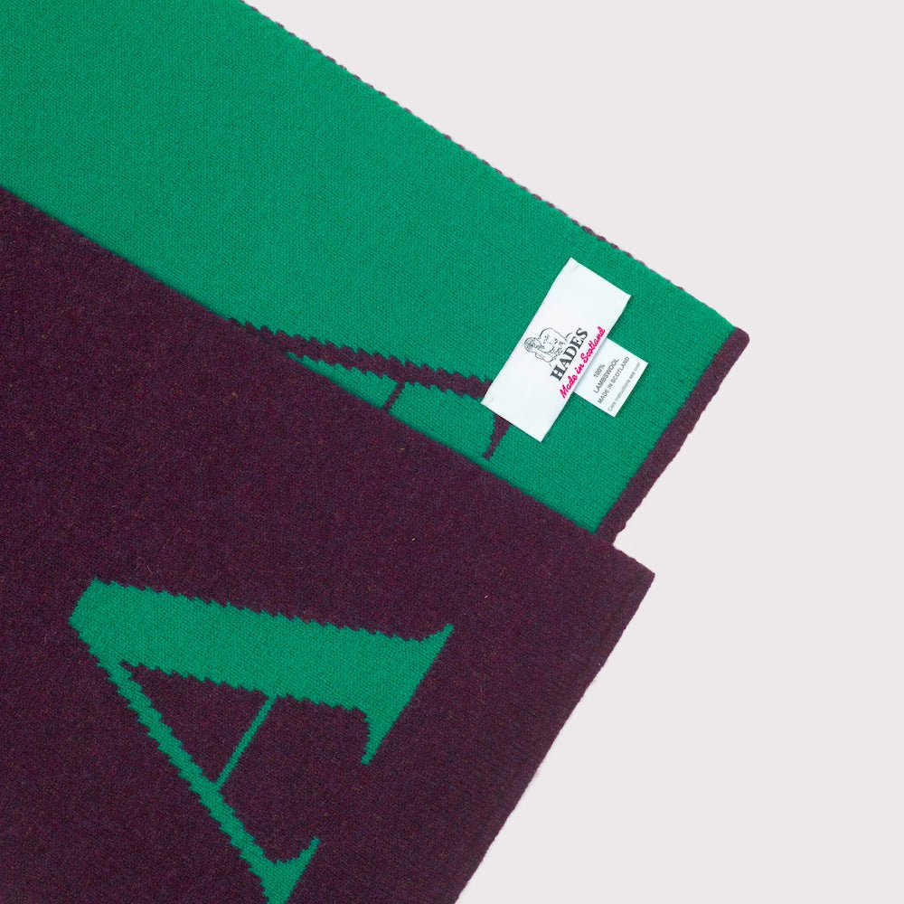 Flat image of the detail and label of the 'A' scarf