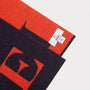Flat image of the 'E' scarf details and label
