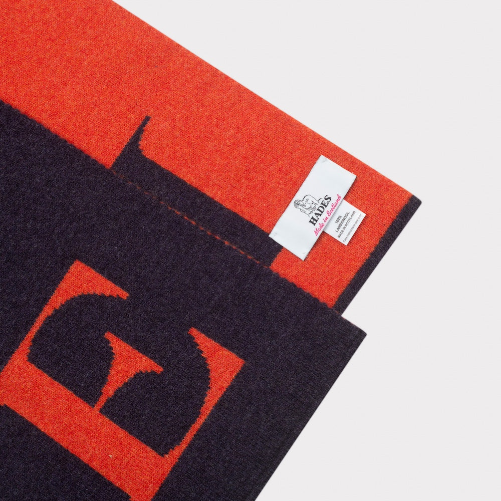 Flat image of the 'E' scarf details and label