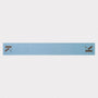 HADES Alphabet letter K scarf in blue and brown flatlay
