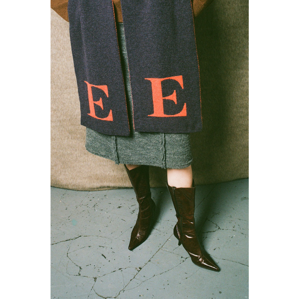 Model wearing HADES E scarf