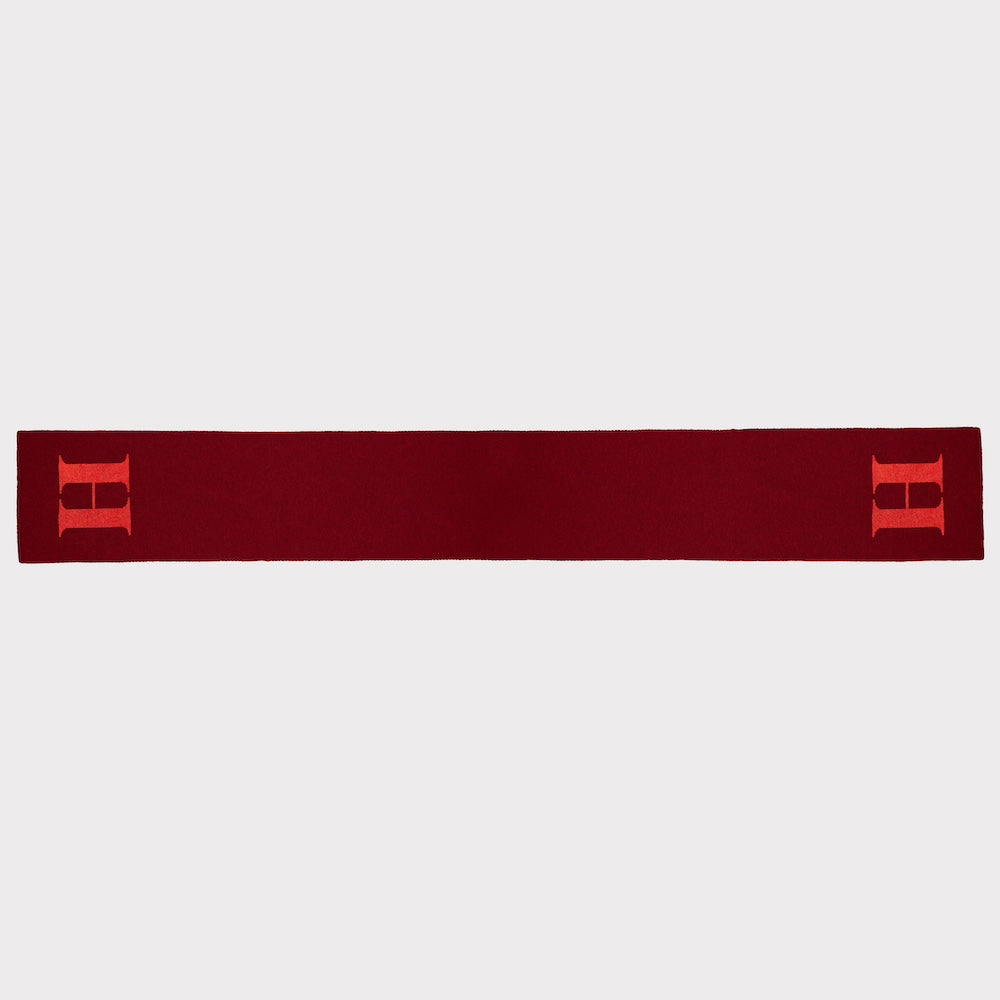 Front image of 'H' scarf laid flat.