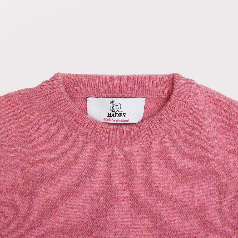 Close up of the neckline on the pink and green Blondie vest