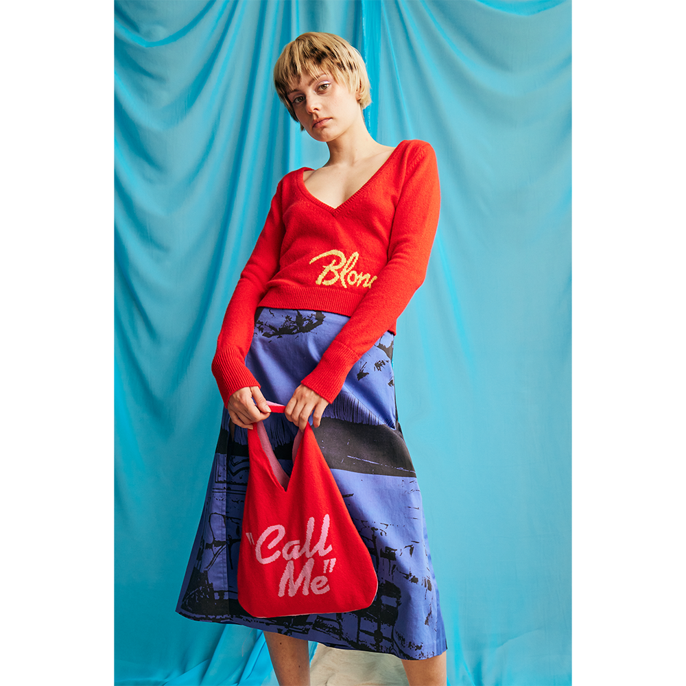 Model wearing HADES Blondie "Call Me" bag 