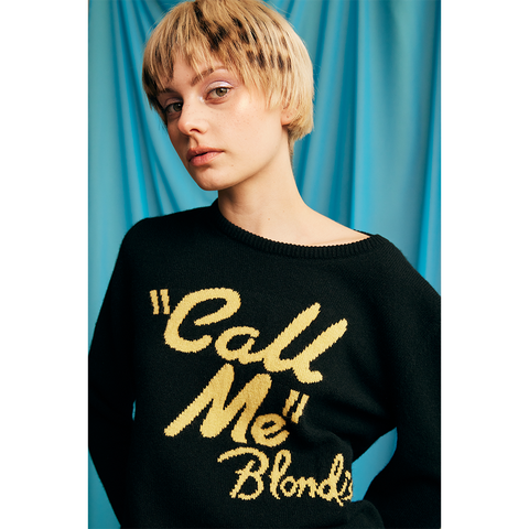 Model in the black and yellow 'Call Me' Blondie jumper