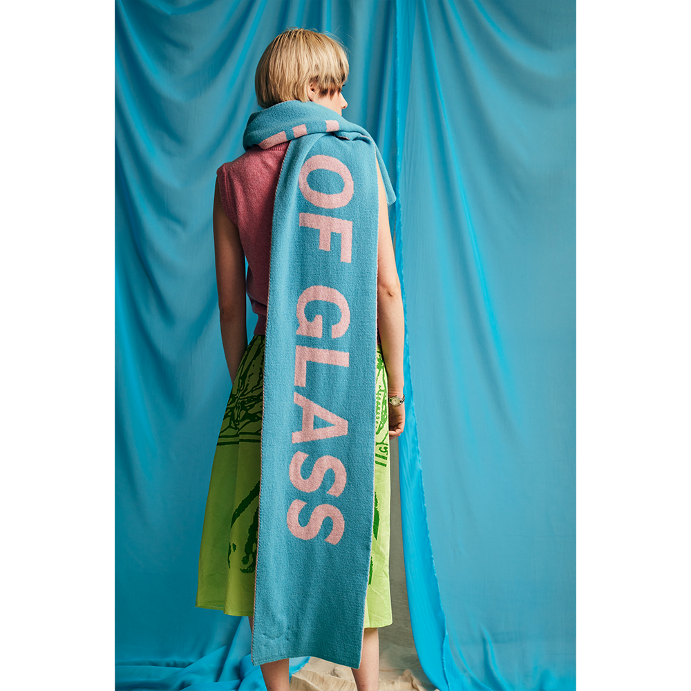 Model wearing HADES Blondie 'Heart of Glass' scarf