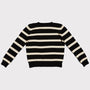 Back flat shot of the the black and white striped Blondie jumper 