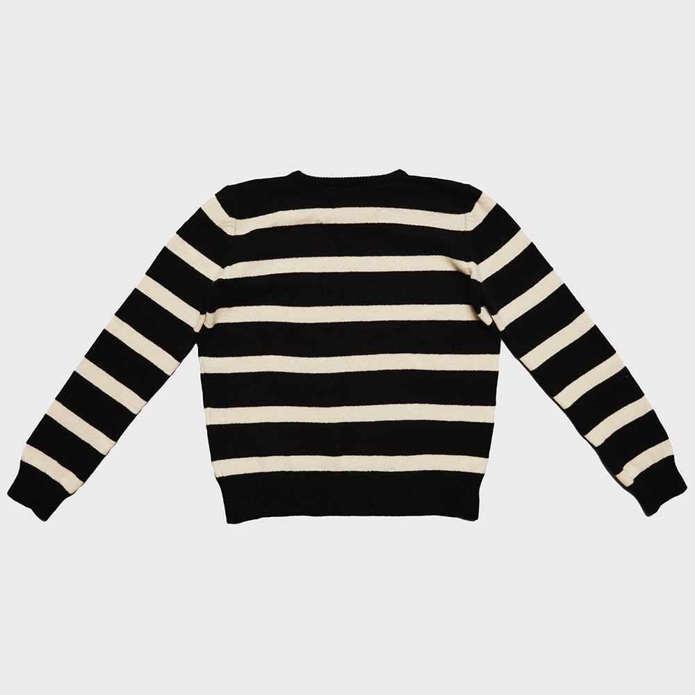 Back flat shot of the the black and white striped Blondie jumper 