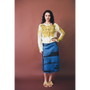 Model wearing HADES Wool Bodice Cardigan on brown backdrop