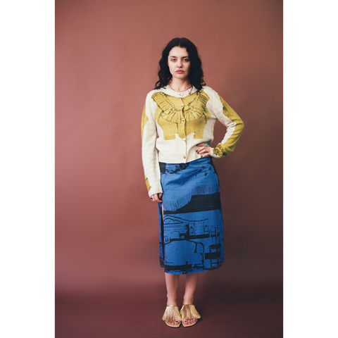Model wearing HADES Wool Bodice Cardigan on brown backdrop