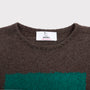 Detail flatshot of neckline and label on Gesture knit.