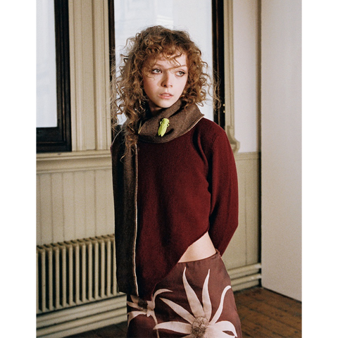 Model wearing HADES Beetle scarf