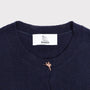 Image of the neckline on the HADES Misfortune Charm Cardigan