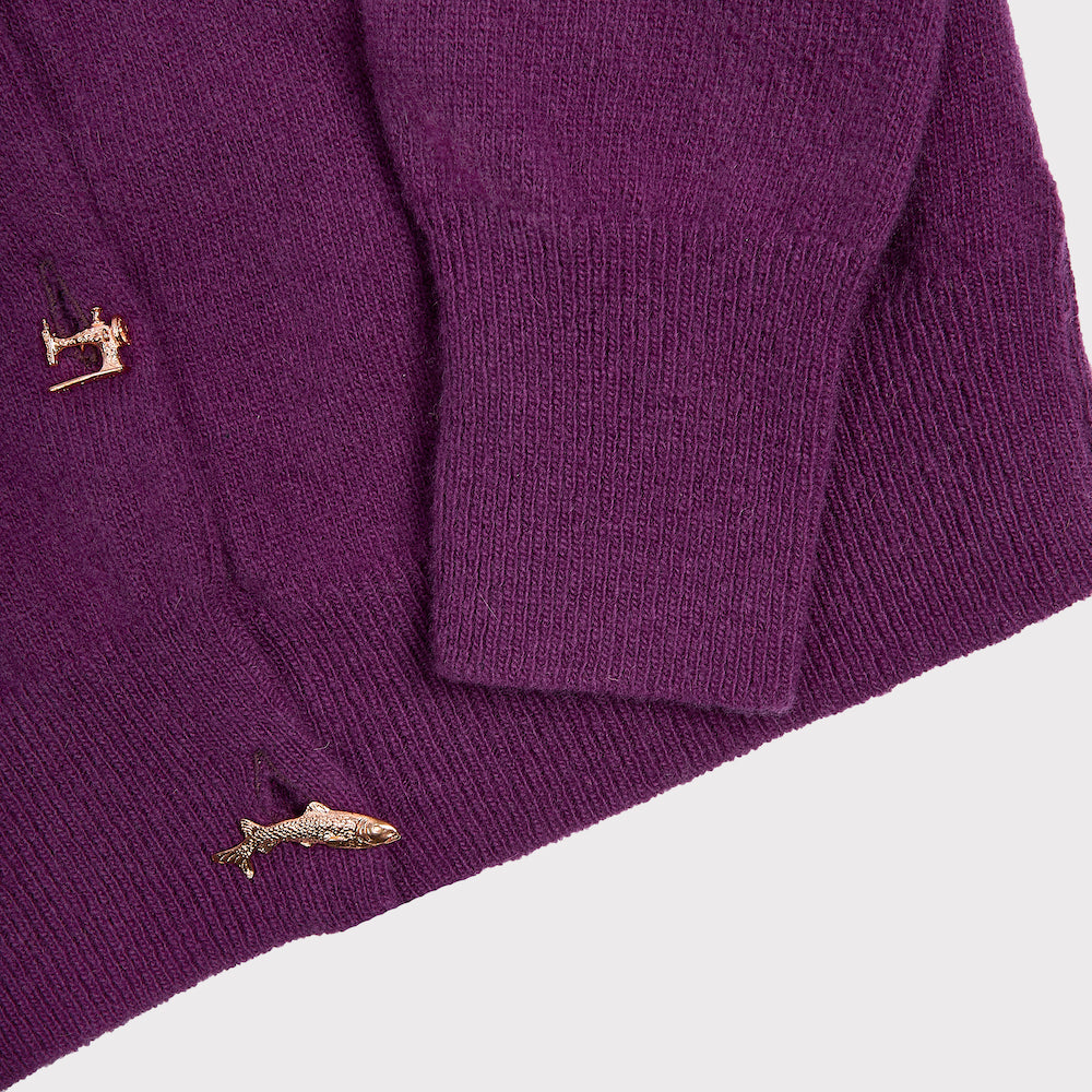Image of the sleeve detail of the HADES Good Fortune Charm Cardigan