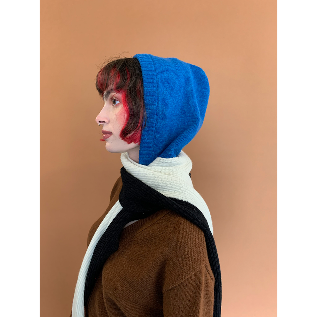 Model wearing Hades Hooded Scarf side view.