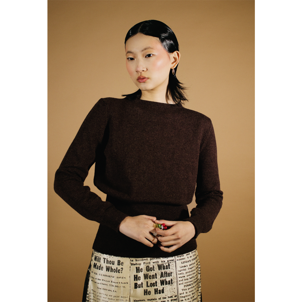 Upclose shot of the brown Edie jumper from the DADA collection