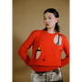 Upclose shot of the orange Selavy jumper from the DADA Collection