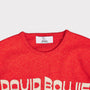 Up close shot of the neckline on the orange and oatmeal men's 'Hunky Dory' David Bowie jumper