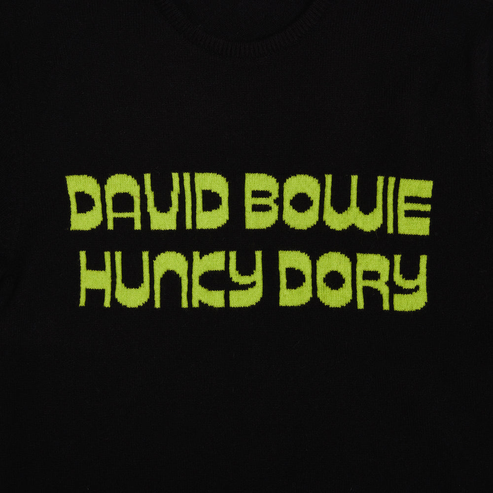 Close up of the text on the black and lime men's 'Hunky Dory' jumper