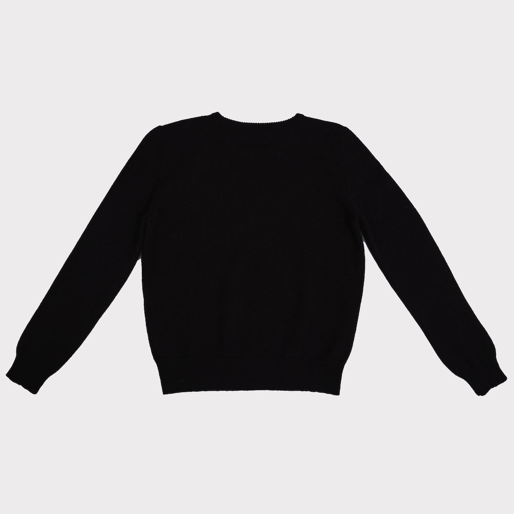Back flat shot of the women's black and white 'The man who sold the world' David Bowie jumper