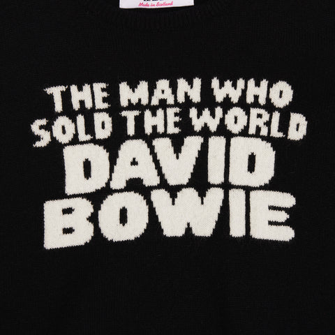 Up close of the text from the women's black and white 'The man who sold the world' David Bowie jumper