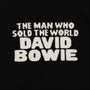 Up close of the text from the men's black and white 'The man who sold the world' David Bowie jumper