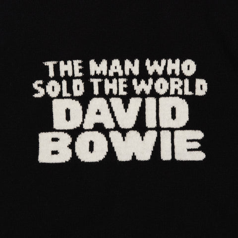 Up close of the text from the men's black and white 'The man who sold the world' David Bowie jumper