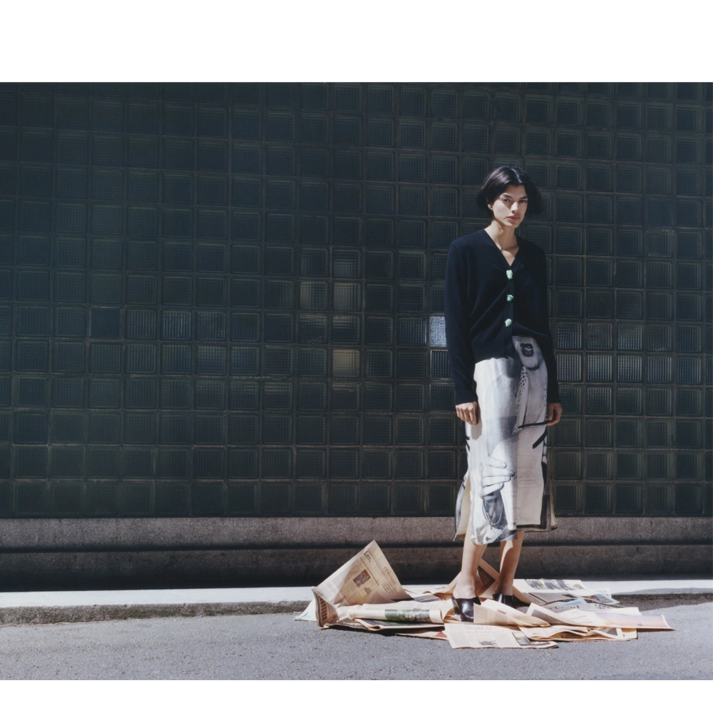 Model wearing the Ordinary Happiness Skirt with the HADES Greek Mythology Carrington Cardigan. 
